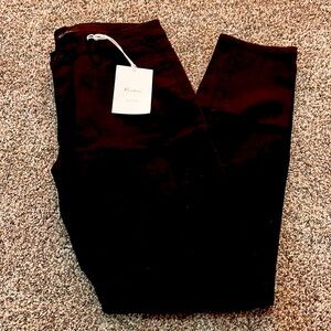 Kancan black skinny jeans; no distressing. Brand new with tags. size 11/29